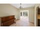 Dining room with a view of the sunroom and kitchen at 2397 Cannolot Blvd, Port Charlotte, FL 33948