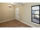 Simple entryway with tile flooring and a view to the backyard at 2397 Cannolot Blvd, Port Charlotte, FL 33948