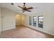 Spacious living room featuring tile floors and large windows at 2397 Cannolot Blvd, Port Charlotte, FL 33948