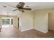 Open living area with tile floors and access to other rooms at 2397 Cannolot Blvd, Port Charlotte, FL 33948