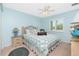 Cozy bedroom with a comfortable bed and plenty of natural light at 409 Boundary Blvd, Rotonda West, FL 33947