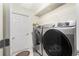 Laundry room with modern washer and dryer at 409 Boundary Blvd, Rotonda West, FL 33947