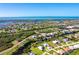 Aerial view highlighting home's coastal location and waterfront access at 4678 Arlington Dr, Placida, FL 33946