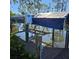 Covered boat lift with electric controls at 4678 Arlington Dr, Placida, FL 33946