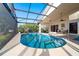 Stunning kidney-shaped pool with a screened enclosure and plenty of patio space at 4678 Arlington Dr, Placida, FL 33946