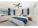 Spacious bedroom with a queen-size bed and ample closet space at 537 Shamrock Blvd, Venice, FL 34293