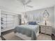 Bedroom with a full-size bed and ample closet space at 560 Sandlor Dr, Englewood, FL 34223