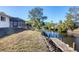 Peaceful waterfront property with private dock and canal views at 560 Sandlor Dr, Englewood, FL 34223