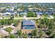 Aerial view showcasing home's location and backyard pool at 15625 Melport Cir, Port Charlotte, FL 33981
