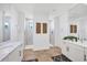 Modern bathroom with double vanity and walk-in shower at 15625 Melport Cir, Port Charlotte, FL 33981