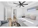 Bedroom with a queen bed and access to hallway at 15625 Melport Cir, Port Charlotte, FL 33981