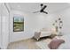 Two twin beds in a well-lit bedroom at 15625 Melport Cir, Port Charlotte, FL 33981