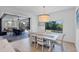 Bright dining room with sliding doors leading to the backyard patio at 15625 Melport Cir, Port Charlotte, FL 33981