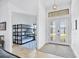 Entryway with view of a triple bunk bed in adjacent room at 15625 Melport Cir, Port Charlotte, FL 33981