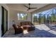 Relaxing patio with seating area and view of the pool area at 15625 Melport Cir, Port Charlotte, FL 33981
