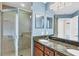 Bathroom with double vanity and walk-in shower at 2001 Bal Harbor Blvd # 2203, Punta Gorda, FL 33950