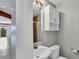 Small bathroom with toilet, sink, and shower at 2001 Bal Harbor Blvd # 2203, Punta Gorda, FL 33950