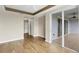Primary bedroom with wood floors and access to balcony at 2001 Bal Harbor Blvd # 2203, Punta Gorda, FL 33950