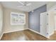 Bedroom with wood floors, ceiling fan and window shutters at 2001 Bal Harbor Blvd # 2203, Punta Gorda, FL 33950