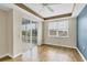 Bedroom with wood floors, access to balcony and window at 2001 Bal Harbor Blvd # 2203, Punta Gorda, FL 33950
