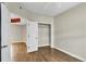 Bedroom with wood floors and a double door closet at 2001 Bal Harbor Blvd # 2203, Punta Gorda, FL 33950