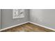 Bright bedroom with wood floors and window at 2001 Bal Harbor Blvd # 2203, Punta Gorda, FL 33950