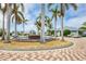 Circular fountain with palm trees in community at 2001 Bal Harbor Blvd # 2203, Punta Gorda, FL 33950
