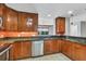 Well-equipped kitchen featuring stainless steel appliances and dark countertops at 2001 Bal Harbor Blvd # 2203, Punta Gorda, FL 33950