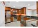 Modern kitchen with stainless steel appliances and granite countertops at 2001 Bal Harbor Blvd # 2203, Punta Gorda, FL 33950
