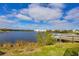 Serene waterfront view with lush vegetation at 2001 Bal Harbor Blvd # 2203, Punta Gorda, FL 33950