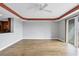 Bright living room featuring wood floors and a ceiling fan at 2001 Bal Harbor Blvd # 2203, Punta Gorda, FL 33950