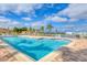 Inviting community pool with ample lounge chairs and patio area at 2001 Bal Harbor Blvd # 2203, Punta Gorda, FL 33950