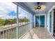Relaxing screened balcony overlooking tree-lined street at 2001 Bal Harbor Blvd # 2203, Punta Gorda, FL 33950