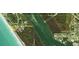 Aerial view of waterfront property with access to the waterway at 265 Green Dolphin S Dr, Placida, FL 33946