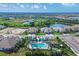 Luxury community homes and central pool at 26812 Pavin Dr, Englewood, FL 34223