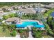 Community pool and surrounding homes view at 26812 Pavin Dr, Englewood, FL 34223