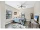 Comfortable bedroom with a queen bed and plenty of natural light at 26812 Pavin Dr, Englewood, FL 34223