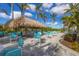 Tropical-themed cabana with seating for residents at 26812 Pavin Dr, Englewood, FL 34223