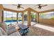 Relaxing covered patio overlooking a refreshing pool at 26812 Pavin Dr, Englewood, FL 34223
