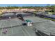 Aerial view of multiple tennis courts available for residents at 26812 Pavin Dr, Englewood, FL 34223