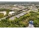 Aerial view of community featuring houses and waterways at 2759 Lavandula Ct, North Port, FL 34289