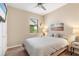 Bright bedroom with comfortable bed and wall-mounted TV at 2759 Lavandula Ct, North Port, FL 34289