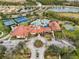 Community center with pools, tennis courts, and parking at 2759 Lavandula Ct, North Port, FL 34289