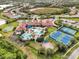 Community features pools, tennis courts, bocce, and gardens at 2759 Lavandula Ct, North Port, FL 34289