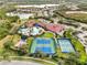 Community amenities include pools, tennis courts, and bocce ball at 2759 Lavandula Ct, North Port, FL 34289