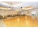 Large community room with a dance floor and tables at 2759 Lavandula Ct, North Port, FL 34289