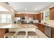 Spacious kitchen with granite island and stainless steel appliances at 2759 Lavandula Ct, North Port, FL 34289