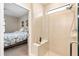 Walk-in shower with glass enclosure and built-in seat at 2759 Lavandula Ct, North Port, FL 34289