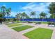 Community shuffleboard courts with green turf at 2759 Lavandula Ct, North Port, FL 34289