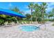 Relax in the community spa with shaded seating nearby at 2759 Lavandula Ct, North Port, FL 34289
